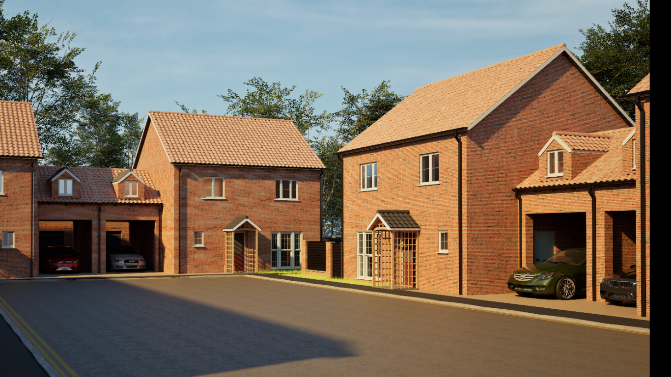 Row of modern red brick houses with a clear blue sky and trees in the background.